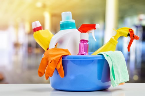 Carpet cleaning team preparing equipment safely