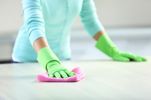 Trained carpet cleaning staff using protective equipment