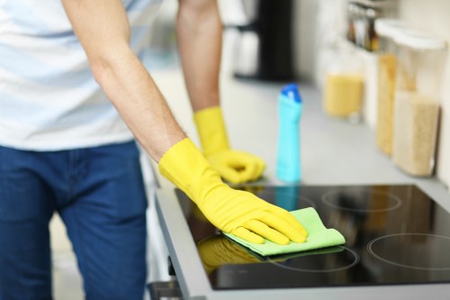 Local SE18 cleaner maintaining a commercial workspace